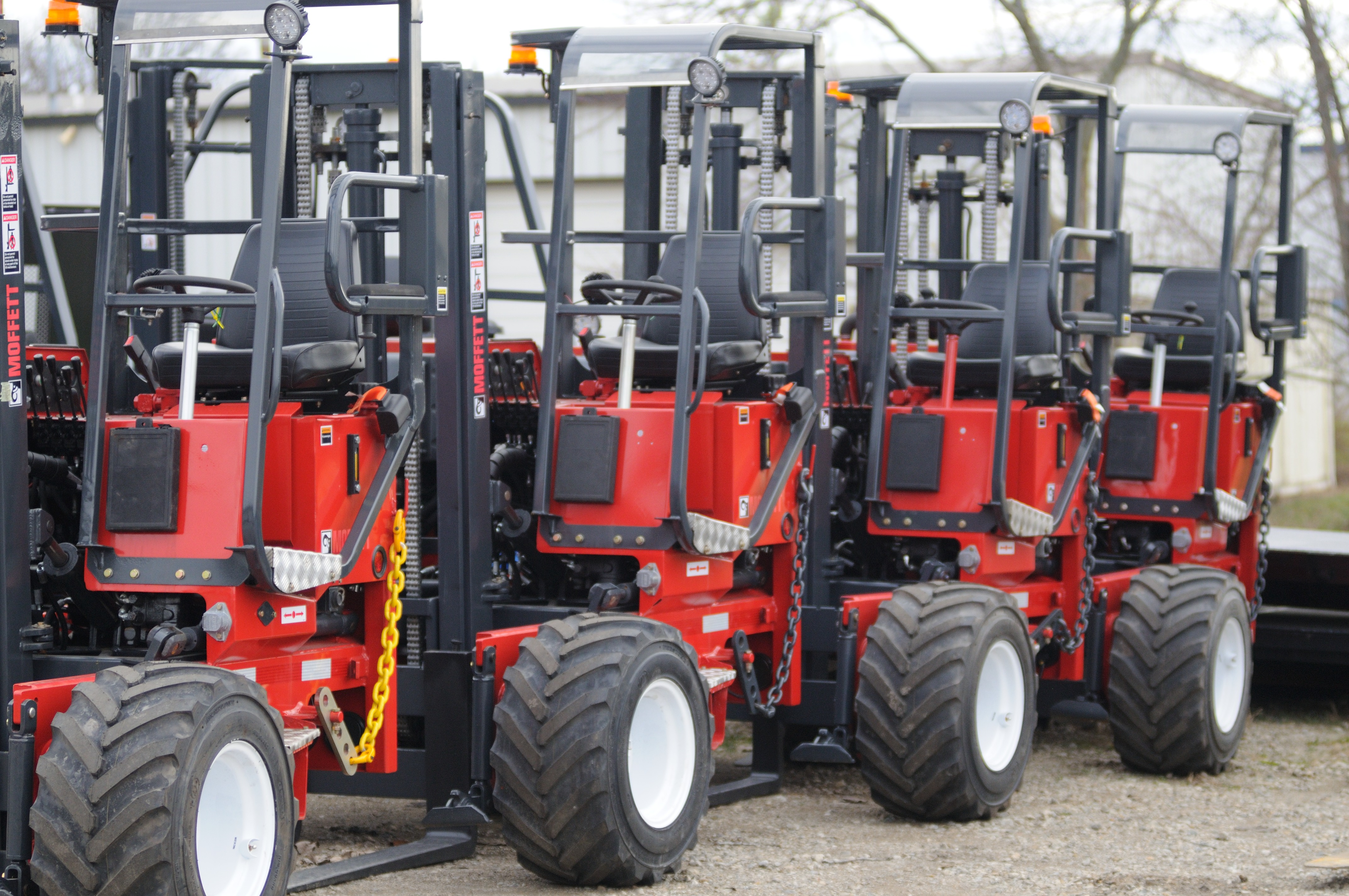 Row of reconditioned off road fork lifts
